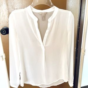 White sheer long sleeve blouse